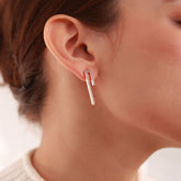 18K gold-plated hook-shaped earrings with a minimalist and elegant design